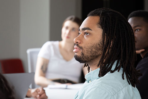 A man sitting in class